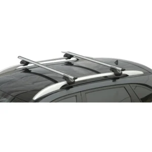Real automotive installation shot of RB007 aluminum roof crossbars on vehicle open rails showing laser engraved logos