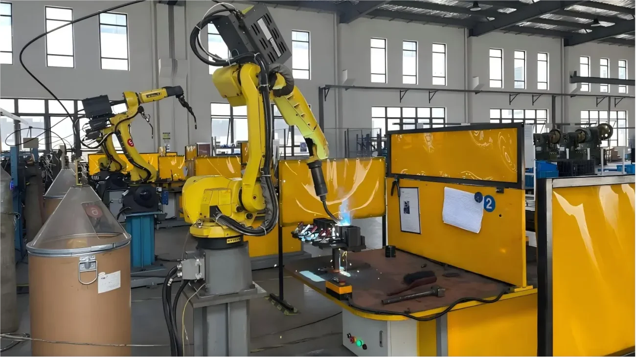 Automated robotic welding and machining line for heavy-duty roof rack production